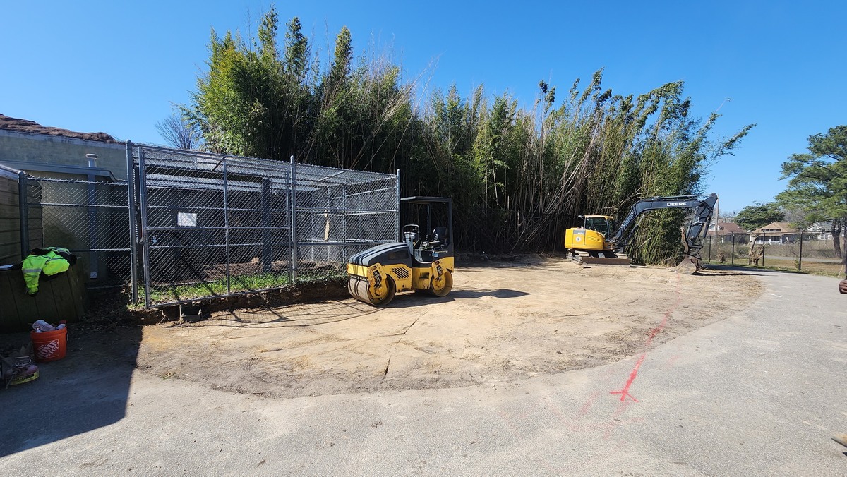 During: grading beside the enclosure