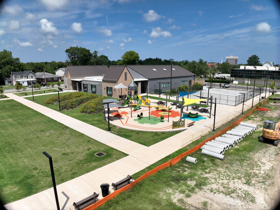 Finished playground and shade shelter with connecting paths
