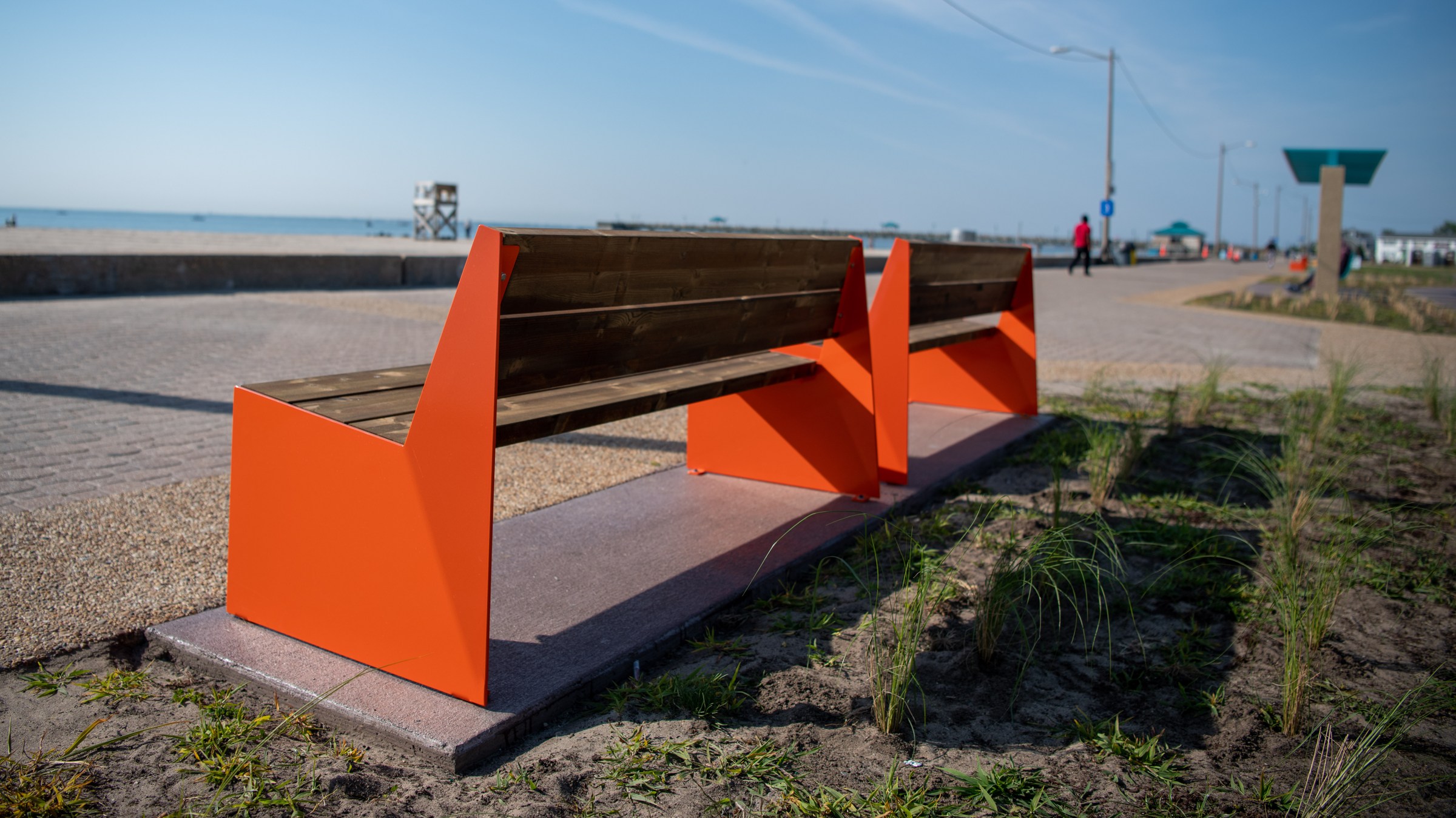 New benches and decorative concrete finishes bring color and seating to the promenade.